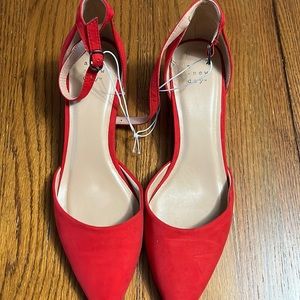 Never worn before . Size 9.5 , women’s red short heel